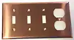 Standard triple toggle and one outlet switchplate