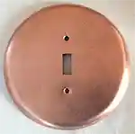 Round toggle switchplate